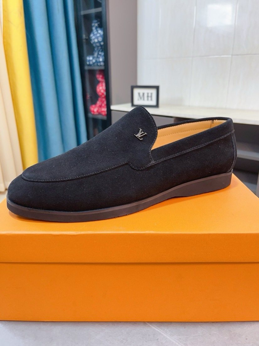 Louis Vuitton Textured Slip-On Loafers — front