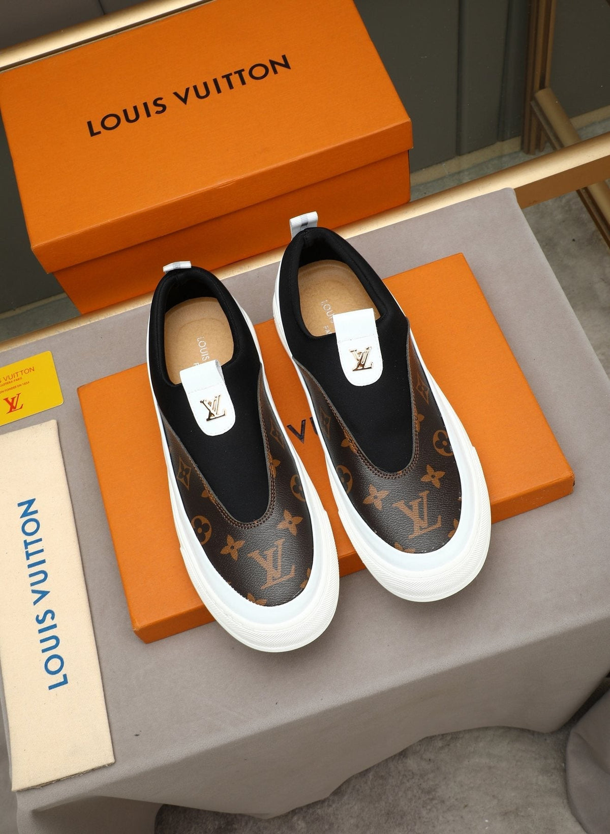 Louis Vuitton Monogram Slip-On Sneakers — front